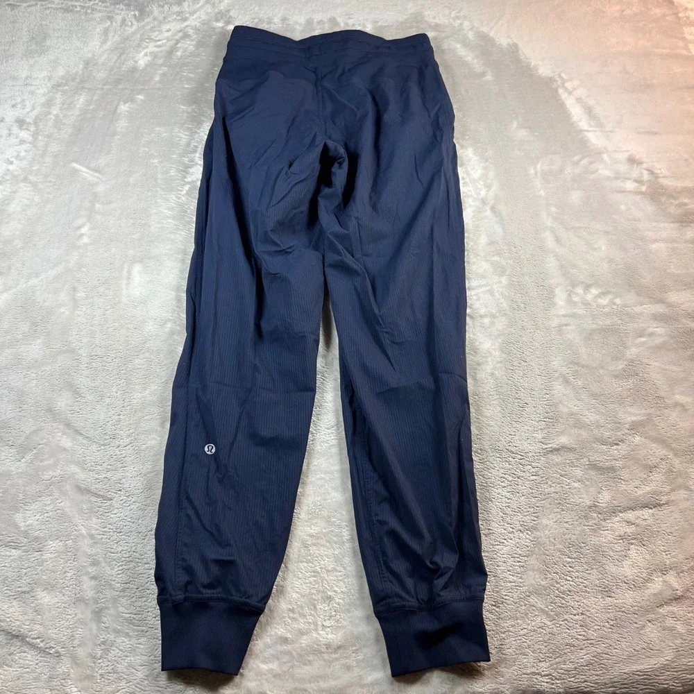 Lululemon Women's 4 Beyond‎ the Studio Jogger Navy Blue Pinstripe LW5ENMS
